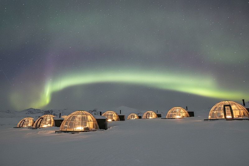 Glass igloo accommodation under the northern lights